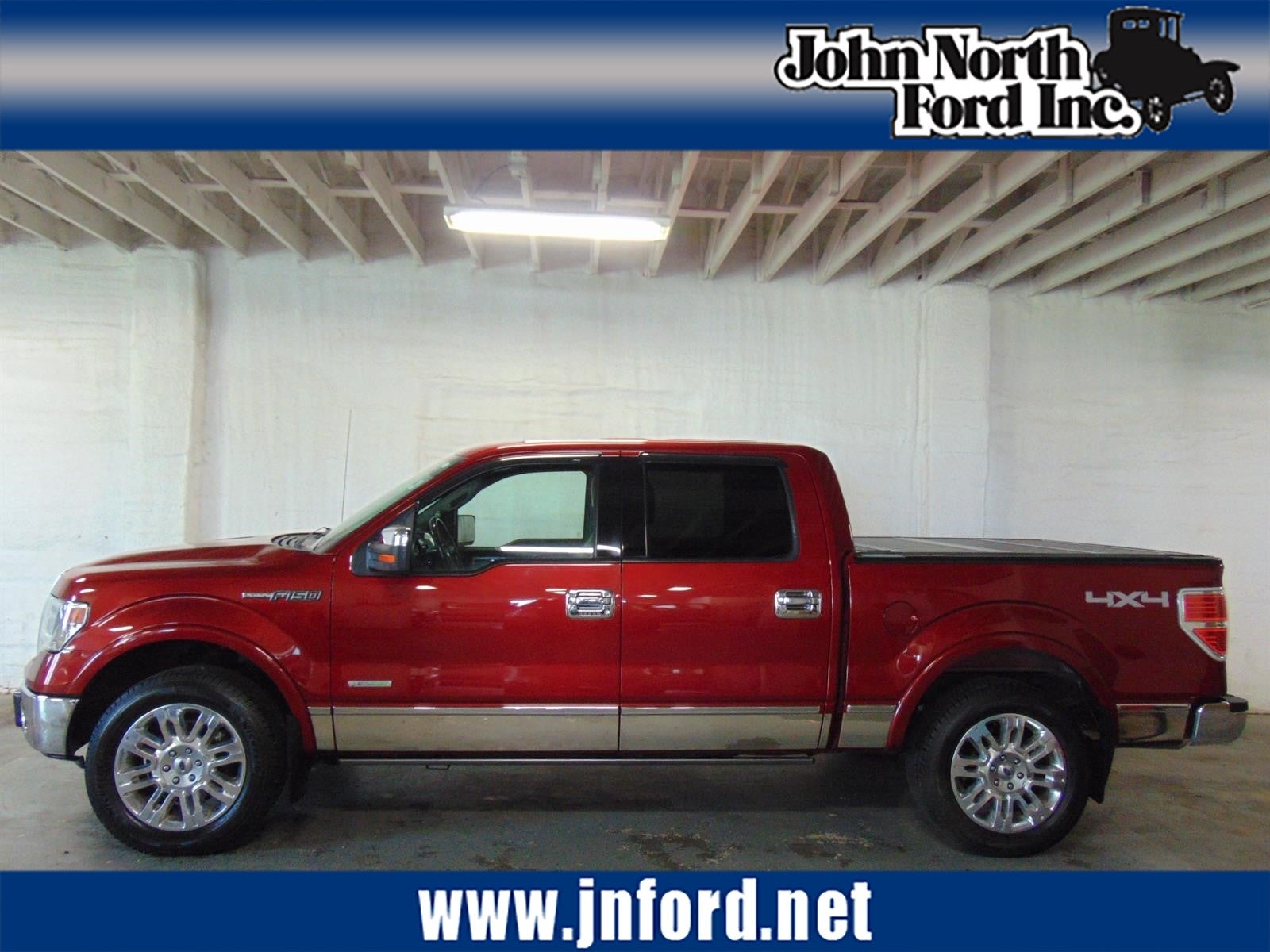 2014 Ford F-150 Platinum in Ruby Red Metallic Tinted Clear Coat (Rr) — front three-quarter view