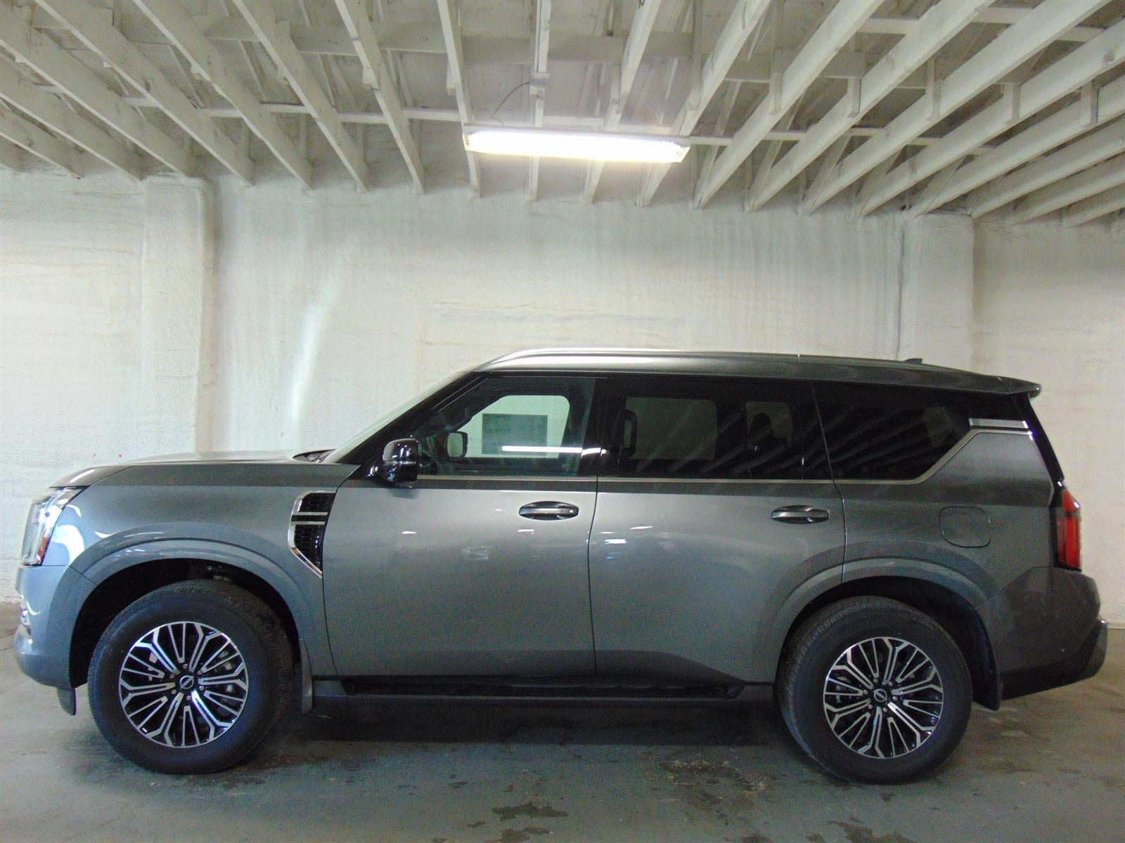 2026 Nissan Armada 4X4 SL in Charcoal/Gun Metall — front three-quarter view